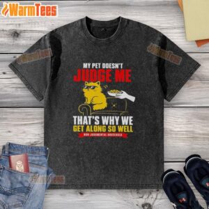 Alt Text: Official orange cat design on a washed t-shirt with the phrase My pet doesn't judge me, that's why we get along.