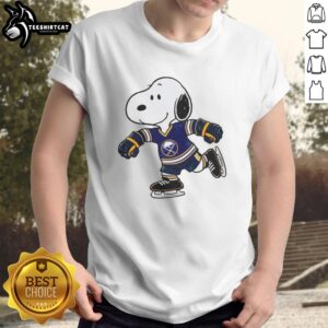 Alt Text: Official Snoopy wearing a Buffalo Sabres ice hockey jersey t-shirt, perfect for fans and collectors of sports apparel.