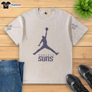 Alt Text: Premium Phoenix Suns NBA Jordan Logo Washed T-Shirt featuring a vintage design in vibrant team colors.