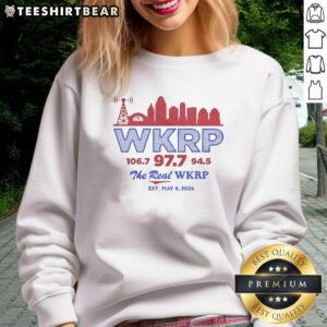 Funny WKRP retro sweatshirt featuring city skyline design, promoting 106.7, 97.7, and 94.5, established May 4, 2026.