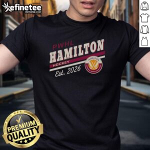 Alt Text: Official PWHL Hamilton Hockey Est 2026 logo t-shirt featuring a bold design and team colors.
