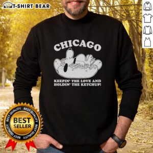 Alt Text: Cozy Top Chicago Snoopy sweatshirt featuring a playful design of Snoopy holding ketchup, perfect for casual wear.