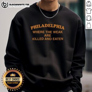 Vintage sweatshirt featuring 'Top Philadelphia: Where The Weak Are Killed And Eaten' graphic design.