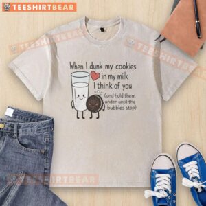 Washed T-shirt with 'Nice When I Dunk My Cookies In My Milk' graphic, perfect for cookie lovers and nostalgic moments.