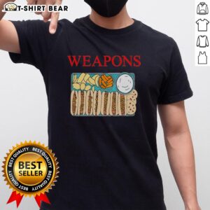 Official Weapons Fast Foods T-Shirt featuring hot dog, cookies, and chips graphic design for food lovers.