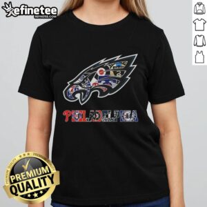 Collage of Philadelphia Eagles NFL logos and Philadelphia sports teams on a ladies tee, perfect for fans.