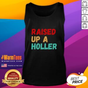 Pretty Raised Up A Holler Vintage Tank Top in a stylish outdoor setting, showcasing its unique design and vibrant colors.