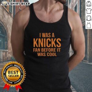 Alt Text: Orange tank top with 'I Was A Knicks Fan Before It Was Cool' text, perfect for New York Knicks fans.