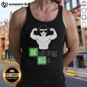 Alt Text: Awesome old man muscular posing bicep in a bulking bad tank top, showcasing impressive strength and fitness.