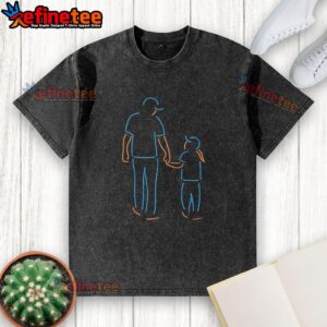 Father and daughter walking in matching neon washed t-shirts, showcasing a stylish and fun family bonding moment.
