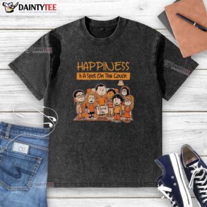 Alt Text: Pretty Happiness Is A Spot On The Couch Eternal Dibs washed t-shirt displayed on a cozy couch with vibrant colors.