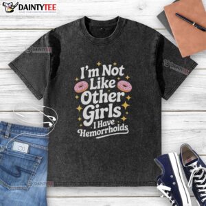 Funny 'I'm Not Like Other Girls, I Have Hemorrhoids' donut graphic on a washed t-shirt for a humorous fashion statement.