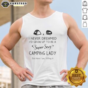Confident woman wearing 'Super Sexy Camping Lady' tank top, enjoying nature and showcasing her adventurous spirit.