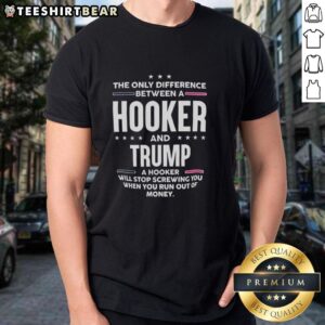 Premium 'The Only Difference Between A Hooker And Trump' T-Shirt featuring bold text and a humorous design.