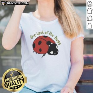 Women enjoying a Good Indie Folk Concert wearing The Last Of Bugs Ladies Tee, capturing a vibrant musical atmosphere.