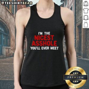 Alt Text: Model wearing 'Hot I'm The Nicest Asshole You'll Ever Meet' tank top, showcasing a trendy and humorous graphic design.