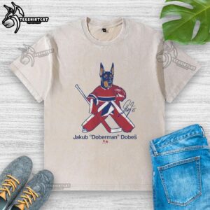 Jakub Dobes wearing a stylish washed t-shirt featuring a Doberman design, showcasing casual fashion.