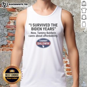 Alt Text: Woman wearing 'I Survived The Biden Years' tank top, supporting Tammy Baldwin's focus on affordability.