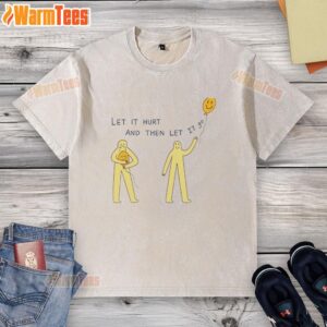 Alt Text: Official Let It Hurt And Then Let It 9 Degrees Washed T-Shirt displayed on a wooden background, showcasing its unique design.