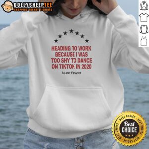 Fashionable individual wearing a nude Project Seven Stars hoodie, heading to work, inspired by TikTok trends from 2020.