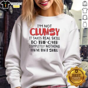 Funny sweatshirt with text 'I'm Not Clumsy, It Takes Skill to Trip Over Nothing' showcasing a humorous design.