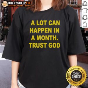 Original A Lot Can Happen In A Month Trust God Ladies Tee in vibrant colors, perfect for casual wear and uplifting messages.