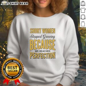Premium short womens sweatshirt with 'Stopped Growing Because We Reached Perfection' tagline in stylish design.