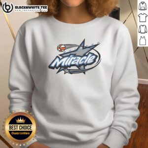 Top Orlando Miracle 99 sweatshirt featuring vibrant team colors and logo, perfect for fans of the Orlando Miracle basketball team.