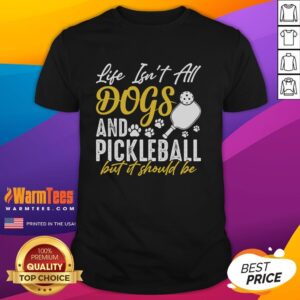 Original Life Isn't All Dogs And Pickleball But It Should Be T-Shirt featuring a fun graphic design for pet and sports lovers.