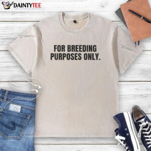 Top for breeding purposes only: stylish washed t-shirt displayed on a hanger, ideal for casual wear and breeding events.