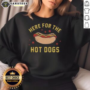 Cozy 'Good Here for the Hot Dogs' sweatshirt featuring playful graphics, perfect for dog lovers and casual wear.