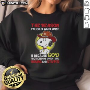 Alt Text: Good Cowboy Snoopy sweatshirt: 'The reason I'm old and wise is God protected me when I was young and stupid.'