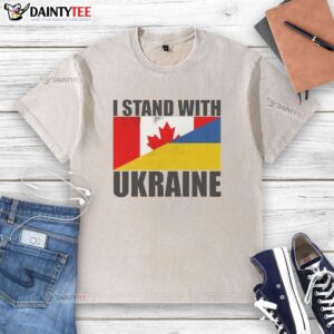 Alt Text: Stylish washed t-shirt featuring the 'I Stand With Ukraine' slogan and flag design, perfect for showing support.