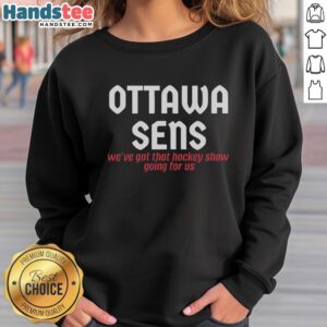 Alt Text: Official Ottawa Senators sweatshirt featuring 'We've Got That Hockey Show Going for Us' design, perfect for fans.