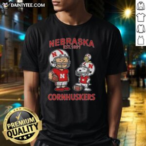 Good Charlie Brown and Snoopy Nebraska Cornhuskers NCAA Football T-Shirt, celebrating the team's legacy since 1891.