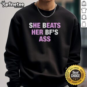 Official She Beats Her BF's Ass sweatshirt featuring bold text design in a stylish, casual fit.