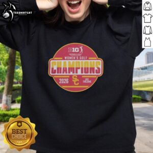 Original USC Trojans 2026 Big Ten Women's Golf Tournament Champions sweatshirt in team locker room setting.