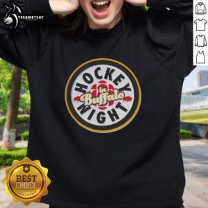 Alt Text: Premium Zach Benson rocking a Hockey Night in Buffalo sweatshirt, showcasing team spirit and style at the game.