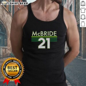 Kayla McBride wearing a stylish Minnesota Lynx tank top, showcasing her support for the WNBA team.