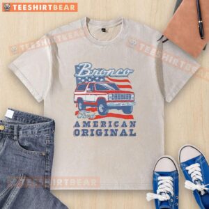 Awesome Ford Bronco American Original T-Shirt with vintage wash, featuring classic car and American flag design.