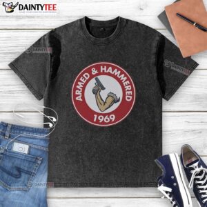 Premium Armed and Hammered 1969 Unise Vintage Washed T-Shirt in a stylish display, showcasing retro design and quality fabric.