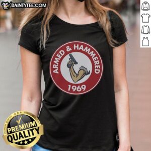 Alt Text: Vintage 1969 Unise ladies tee featuring a premium Armed and Hammered design, perfect for retro fashion enthusiasts.