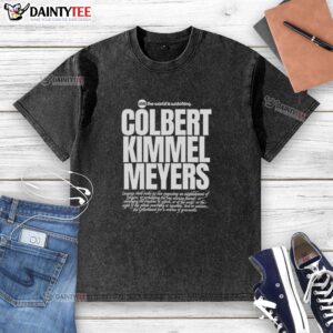 Alt Text: Hot USA The World Is Watching Colbert Kimmel Meyers washed t-shirt showcasing popular late-night show humor.