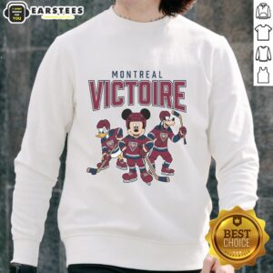 Alt Text: Stylish Montreal Victoire Disney team ice hockey sweatshirt featuring vibrant colors and a comfortable fit.