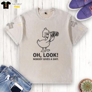 Alt Text: Stylish washed t-shirt featuring Zero Flocks Given graphic, perfect for casual outfits and expressing a carefree attitude.