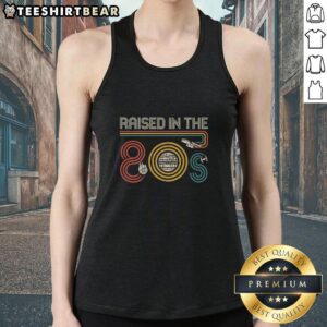 Top I Was Raised In The 80s tank top featuring vibrant retro design, perfect for nostalgic fashion lovers.