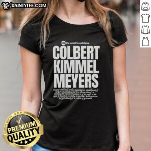 Hot USA 'The World Is Watching' tee featuring Colbert, Kimmel, and Meyers, perfect for fans of late-night comedy.