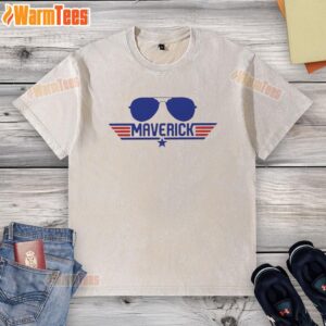 Original Top Gun Maverick aviator sunglasses with retro washed t-shirt displayed on a vintage wooden surface.