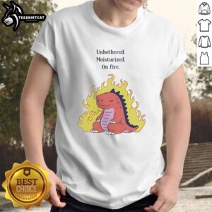 Cool red dinosaur graphic on a 'Moisturized On Fire' T-shirt, showcasing a fun and vibrant design perfect for casual wear.