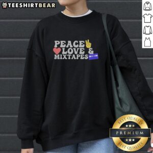 Top Peace Love And Mixtapes Cassette Retro Sweatshirt featuring a vibrant cassette design and cozy fit for vintage style lovers.